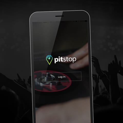 The PitStop app on a phone, showing its log-in screen.